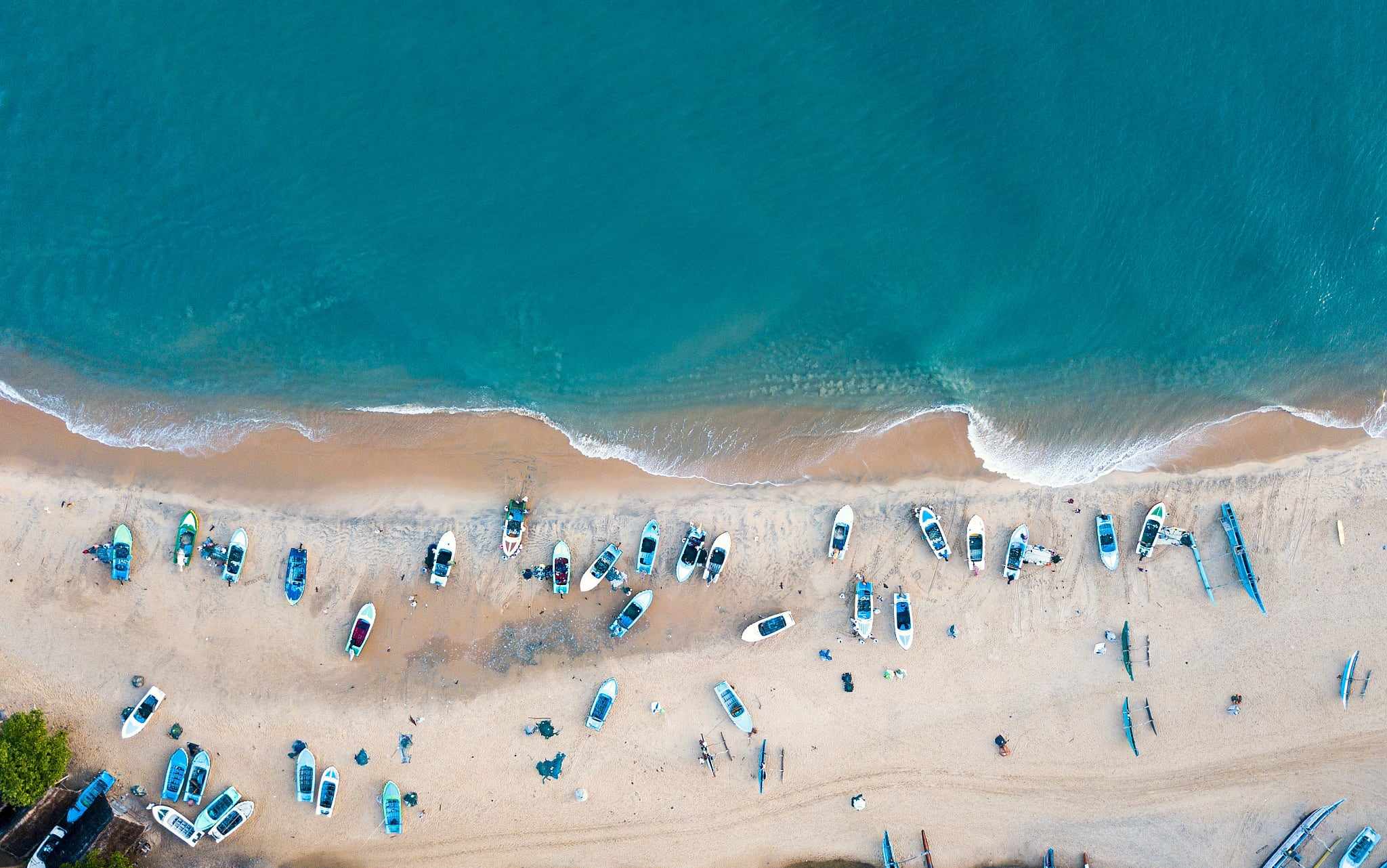 Fishing boats on the beach at Arugam Bay seen from above