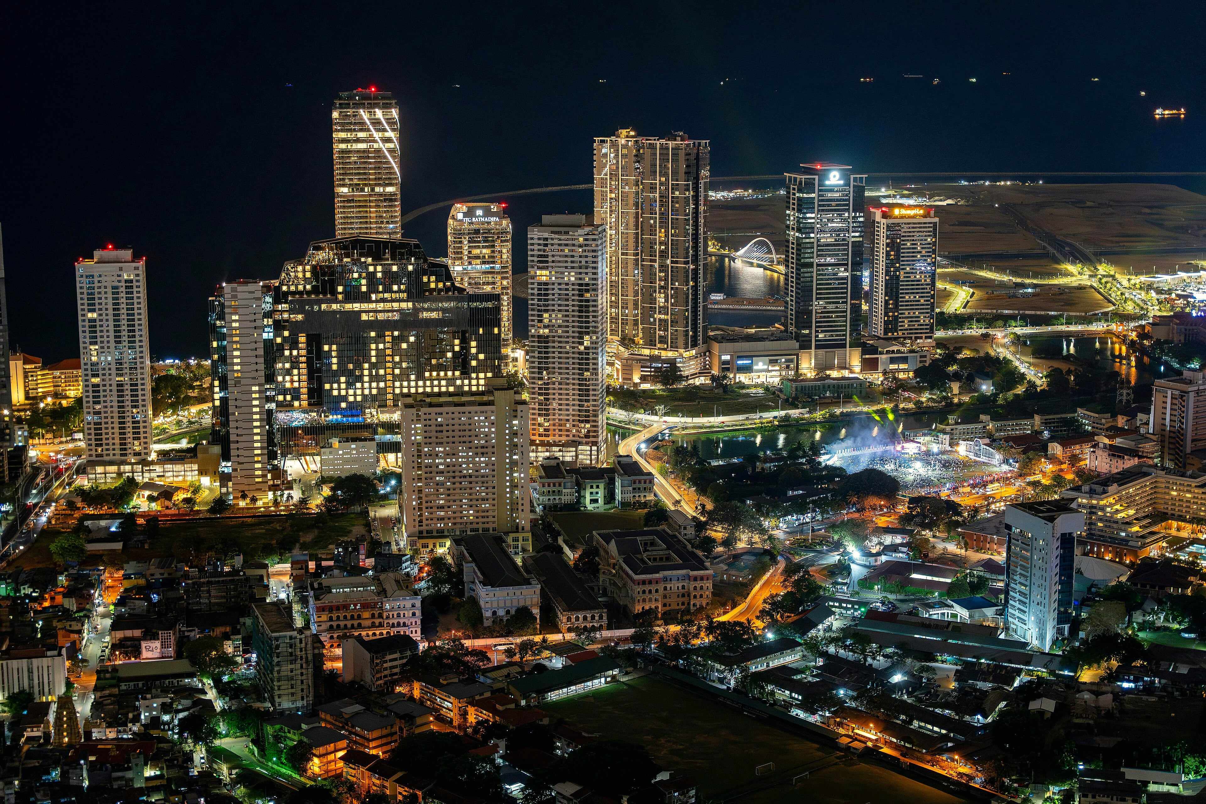 Colombo's skyline lit up at night, seen from the Lotus Tower