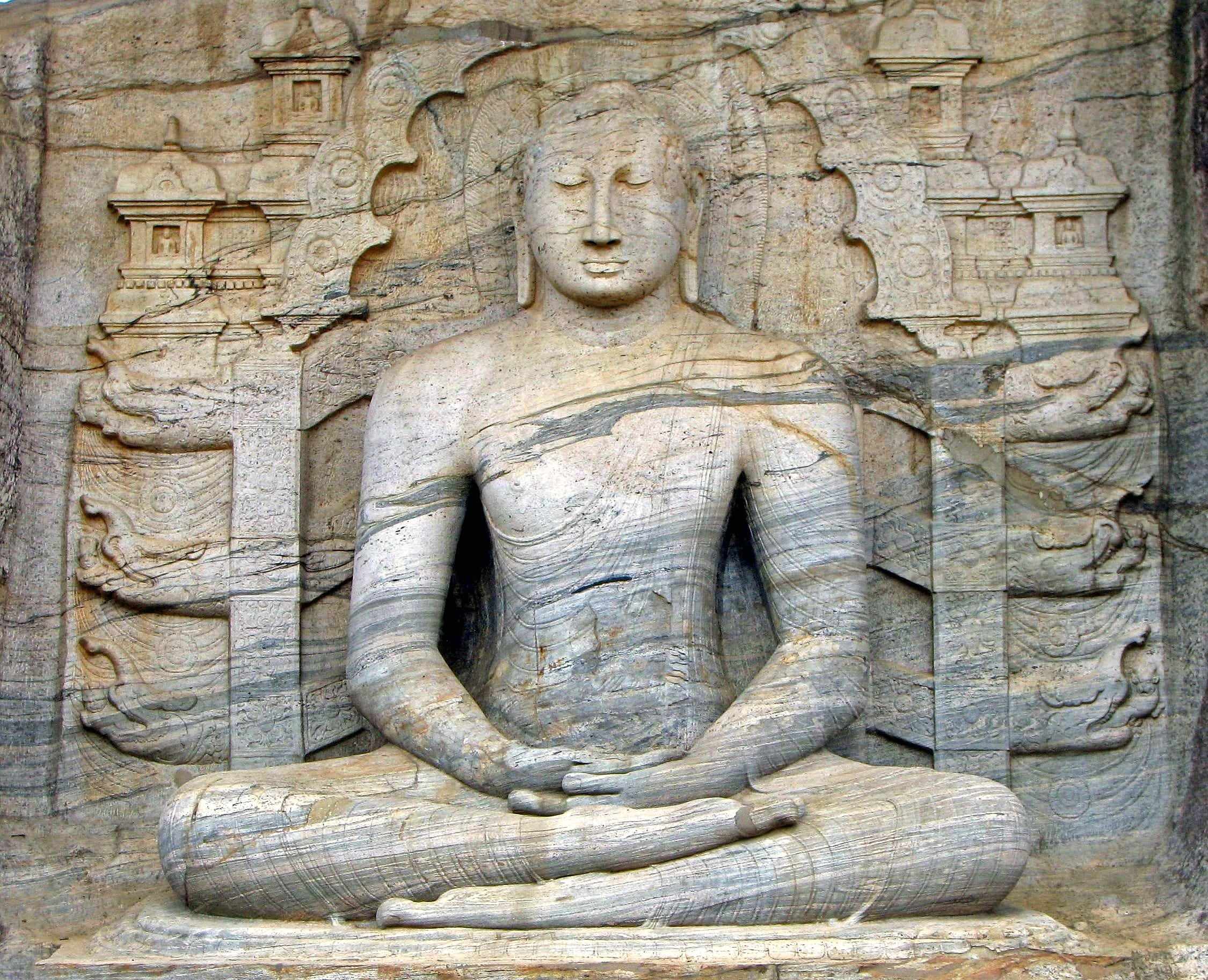 Seated Buddha carved into the granite at Gal Vihara, Polonnaruwa